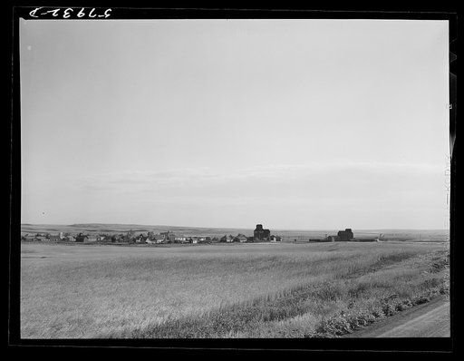 Untitled photo, possibly related to: Grain storage elevators in town near Minot, North Dakota