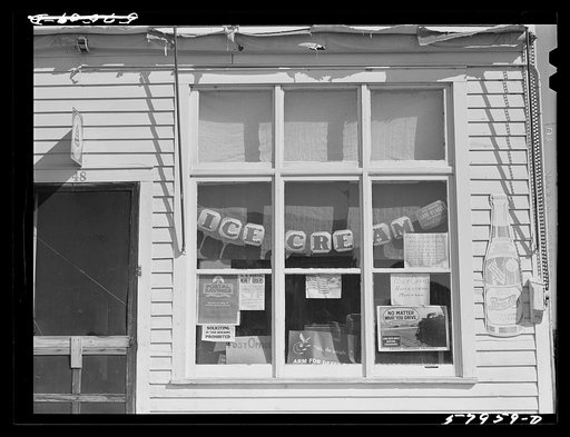 Window of post office and store. Homestead, Montana