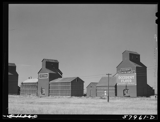 Untitled photo, possibly related to: Grain elevators. Homestead, Montana