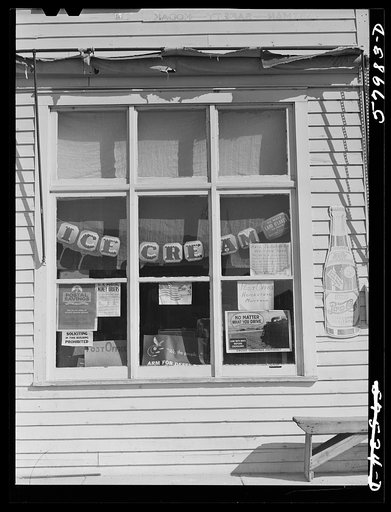 Window of post office and store. Homestead, Montana