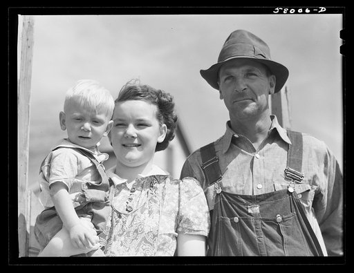 FSA (Farm Security Administration) borrower and two of his children. Laredo, Montana