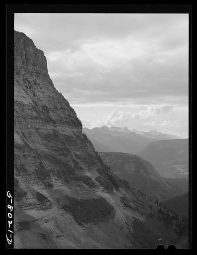 General view of Rocky Mountains west of Continental Divide seen from top of Logan Pass on Going-to-the-Sun highway. Glacier National Park, Montana