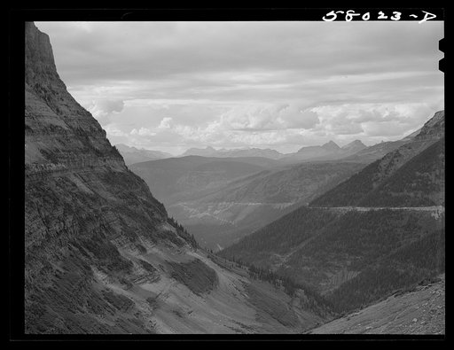 General view of Rocky Mountains west of Continental Divide seen from top of Logan Pass on Going-to-the-Sun highway. Glacier National Park, Montana