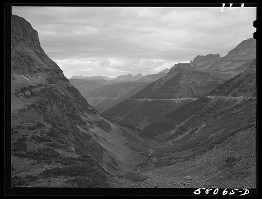General view of Rocky Mountains west of Continental Divide seen from top of Logan Pass on Going-to-the-Sun highway. Glacier National Park, Montana