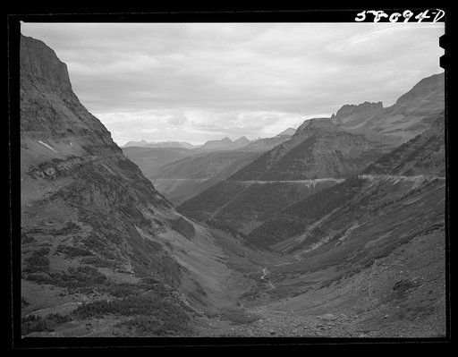 General view of Rocky Mountains west of Continental Divide seen from top of Logan Pass on Going-to-the-Sun highway. Glacier National Park, Montana