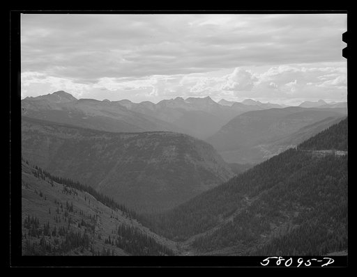 General view of Rocky Mountains west of Continental Divide seen from top of Logan Pass on Going-to-the-Sun highway. Glacier National Park, Montana