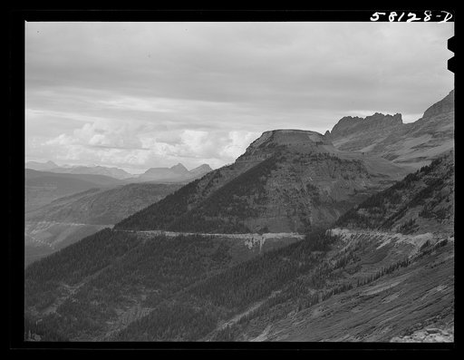 General view of Rocky Mountains west of Continental Divide seen from top of Logan Pass on Going-to-the-Sun highway. Glacier National Park, Montana