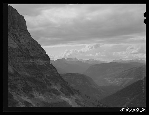 General view of Rocky Mountains west of Continental Divide seen from top of Logan Pass on Going-to-the-Sun highway. Glacier National Park, Montana
