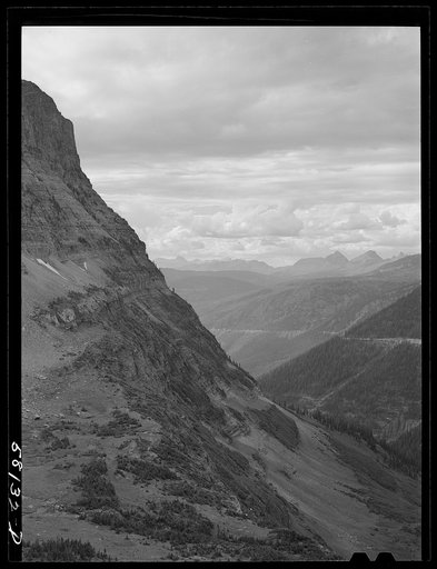 General view of Rocky Mountains west of Continental Divide seen from top of Logan Pass on Going-to-the-Sun highway. Glacier National Park, Montana