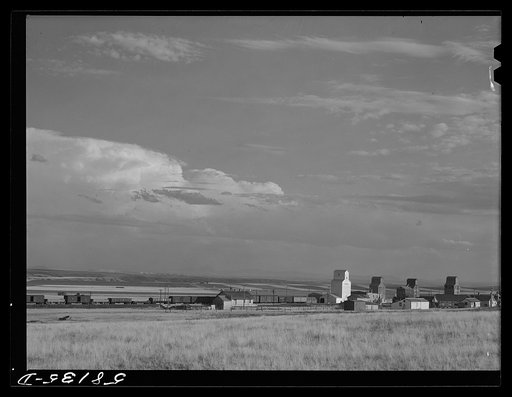 Freight train and grain elevators in Carter, Montana