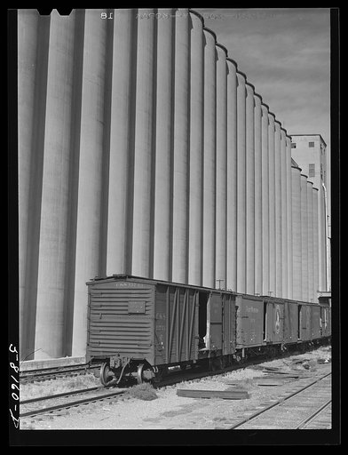 Grain storage, elevators and freight trains. Great Falls, Montana