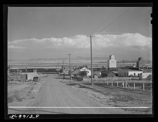 Freight train and grain elevators in Carter, Montana
