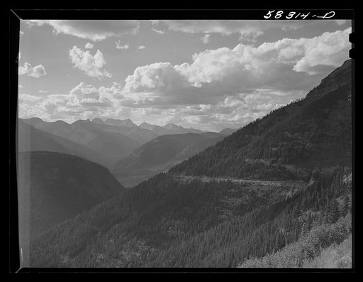 General view of Rocky Mountains west of Continental Divide seen from top of Logan Pass en route to the Sun highway. Glacier National Park, Montana