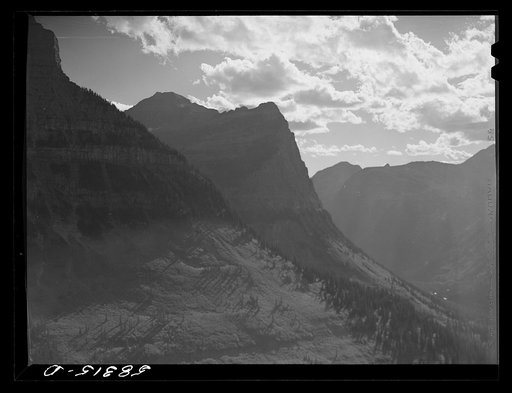 General view of Rocky Mountains west of Continental Divide seen from top of Logan Pass en route to the Sun highway. Glacier National Park, Montana