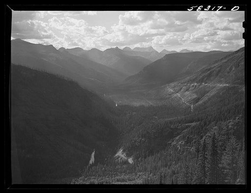 General view of Rocky Mountains west of Continental Divide seen from top of Logan Pass en route to the Sun highway. Glacier National Park, Montana