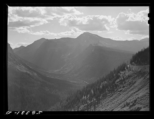 General view of Rocky Mountains west of Continental Divide seen from top of Logan Pass en route to the Sun highway. Glacier National Park, Montana