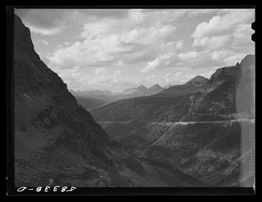 General view of Rocky Mountains west of Continental Divide seen from top of Logan Pass en route to the Sun highway. Glacier National Park, Montana