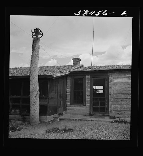 Old ranch house and bell at Quarter Circle U Ranch. Birney, Montana