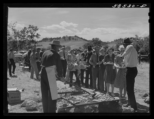 Barbecuing beef at the stockmen's picnic and barbecue. Spears Siding, Wyola, Montana