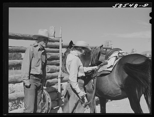Lyman Brewster with a ranch guest in the corral before going for a ride over the range. Quarter Circle U, Brewster-Arnold Ranch Company. Birney Montana