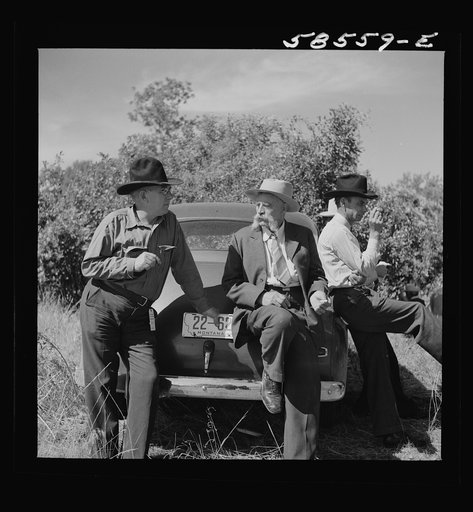 Untitled photo, possibly related to: Spear's Siding, Wyola, Montana. Guests at the stockmen's picnic and barbecue