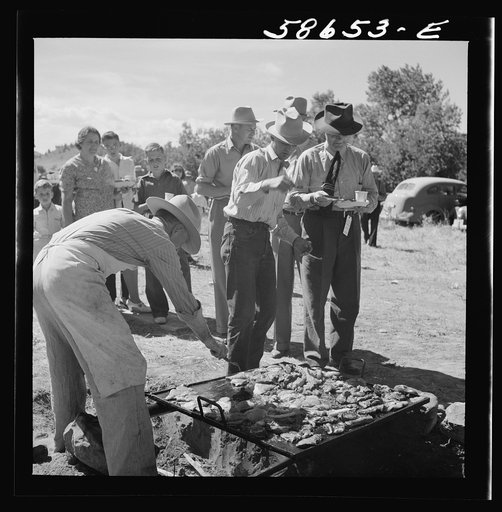 Untitled photo, possibly related to: Waiting in line for barbecued beef at the stockmen's picnic and barbecue. Spear's Siding, Wyola, Montana