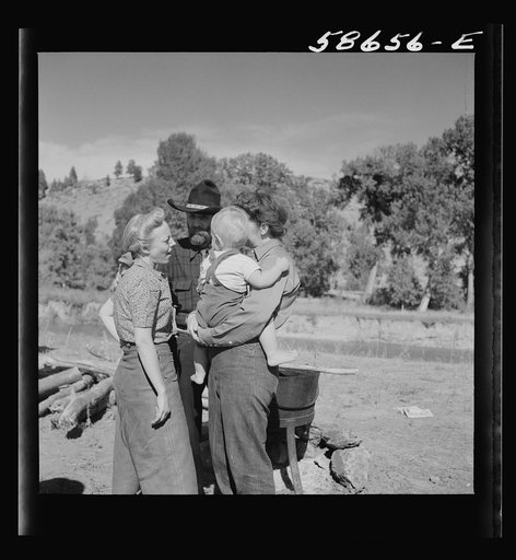 Untitled photo, possibly related to: Spear's Siding, Wyola, Montana. Lyman Brewster of Quarter Circle U Ranch with Sally Rand and her father, Turk Greenough, at a stockmen's picnic and barbecue