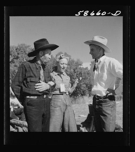 Untitled photo, possibly related to: Spear's Siding, Wyola, Montana. Lyman Brewster of Quarter Circle U Ranch with Sally Rand and her father, Turk Greenough, at a stockmen's picnic and barbecue