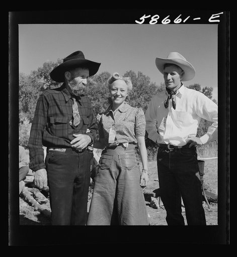 Spear's Siding, Wyola, Montana. Lyman Brewster of Quarter Circle U Ranch with Sally Rand and her father, Turk Greenough, at a stockmen's picnic and barbecue