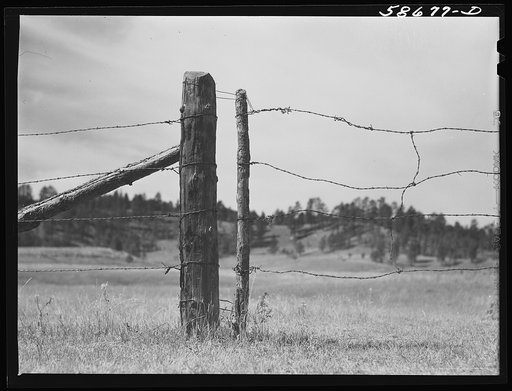 Untitled photo, possibly related to: Fence around ranch grazing lands. Near Birney, Montana