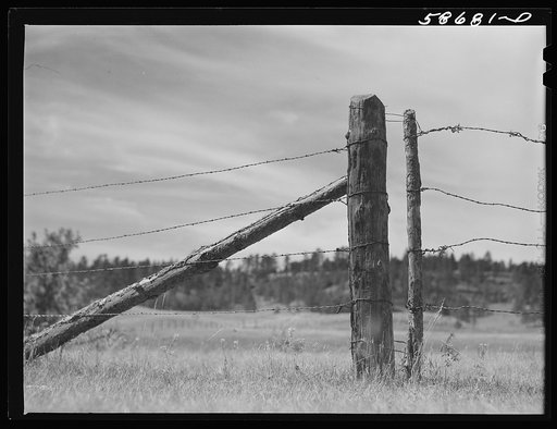 Untitled photo, possibly related to: Fence around ranch grazing lands. Near Birney, Montana