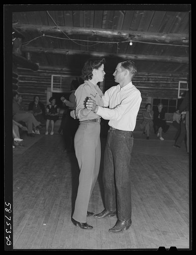 Dude dancing with cowhand on Saturday night in Birney, Montana