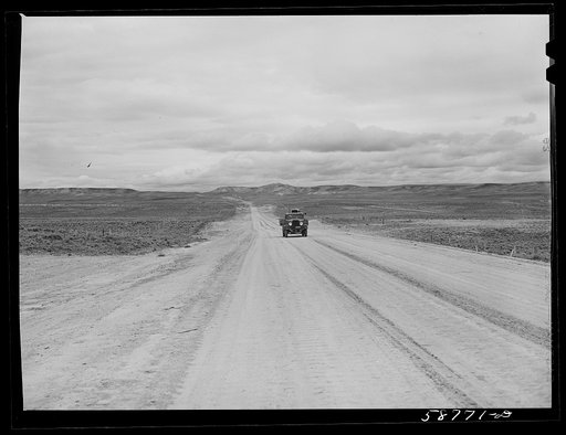 Untitled photo, possibly related to: Road across the plains near Farson, Wyoming