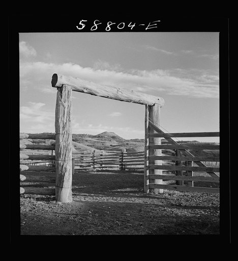 Gate and fence of corral at Quarter Circle U, Brewster-Arnold Ranch Company. Birney, Montana