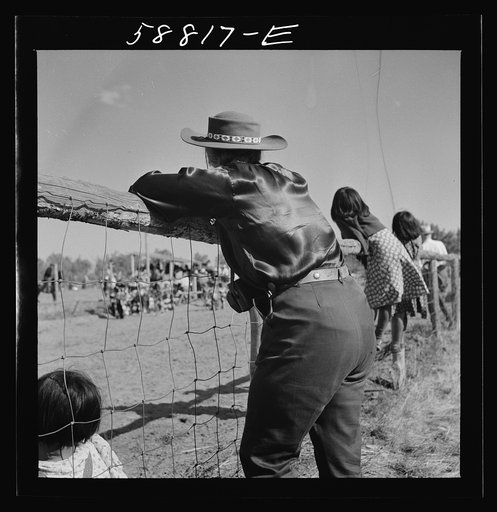 Dude watching the Indian dance at annual fair. Crow Agency, Montana