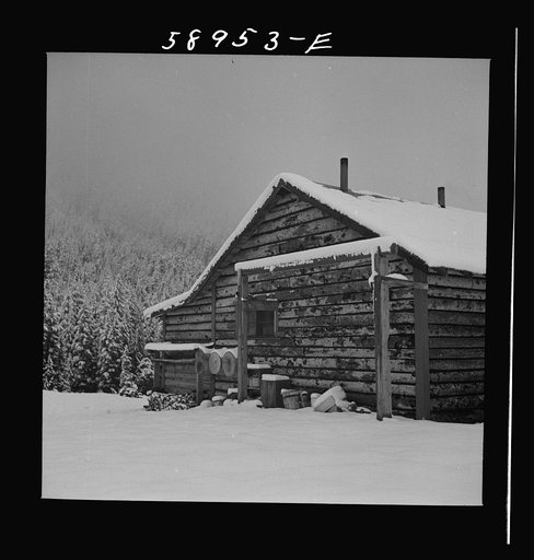 Ranch house after early fall blizzard in mountains near Aspen, Colorado