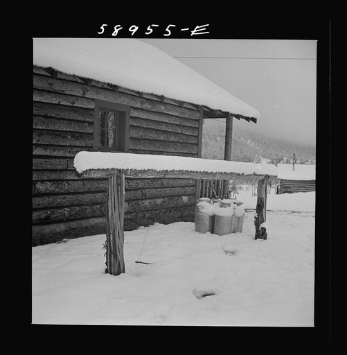 Ranch house after early fall blizzard in mountains near Aspen, Colorado