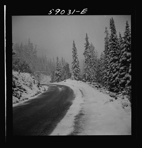 Untitled photo, possibly related to: Highway across the mountains during early fall blizzard near Independence Pass, Colorado