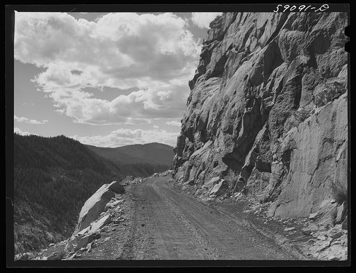 Road leading out of Carlton Tunnel along bed of old narrow gauge railroad on the west side of the Rocky Mountains from Leadville, Colorado