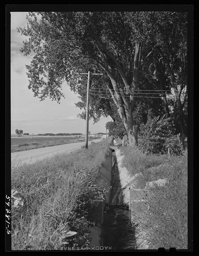 Untitled photo, possibly related to: Irrigation ditch on Scottsbluff Farmsteads, FSA (Farm Security Administration) project. North Platte River Valley, Nebraska