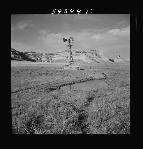 Cattle paths to water hole by windmill on grazing land near Scottsbluff, Nebraska. North Platte River Valley