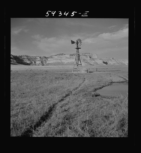 Untitled photo, possibly related to: Cattle paths to water hole by windmill on grazing land near Scottsbluff, Nebraska. North Platte River Valley