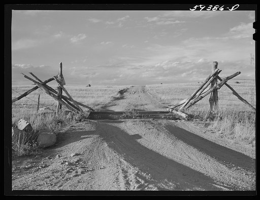 Cattle gate, grazing land on ranch near Buford, Wyoming