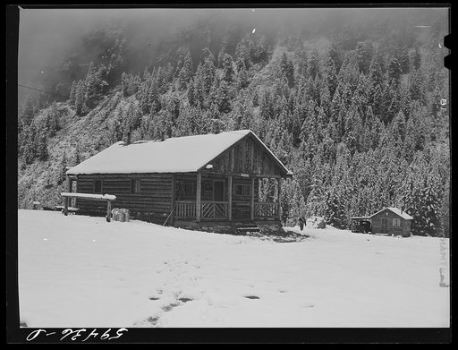 Cabins on ranch after early blizzard. Near Ashcroft Colorado