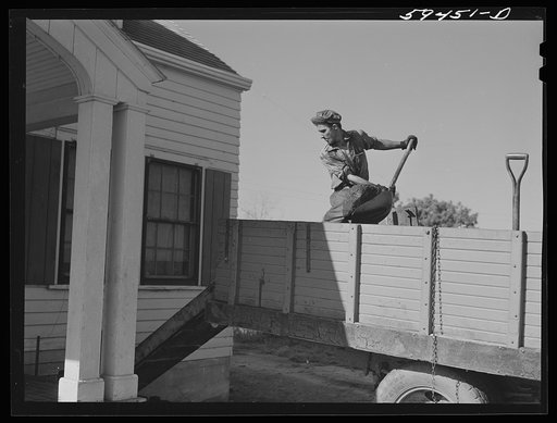 Tony Ringler delivering coal to one of the families of Two River Non-Stock Cooperative, a FSA (Farm Security Administration) co-op at Waterloo, Nebraska