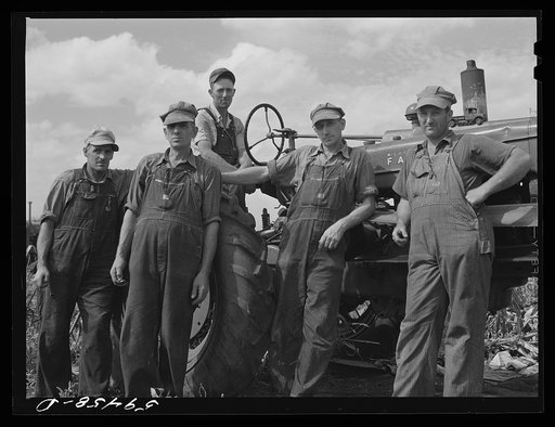 George Leaver, president; Don Shinaut, treasurer; Russell Smith, director; Henry Wollen and Jay Rowell, board of directors of Two River Non-Stock Cooperative, a FSA (Farm Security Administration) co-op, looking at demonstration of Farmall "M" Tractor. Waterloo, Nebraska