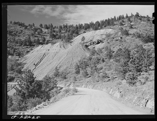 Road from Idaho Springs to Central City, Colorado, showing slag pile and tipple of old mine