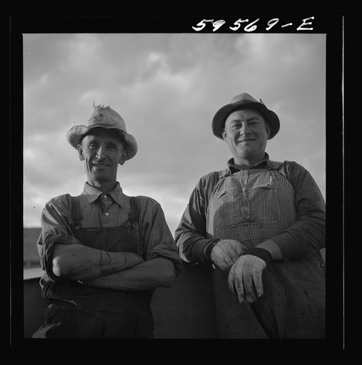 Frank Hagemeister, treasurer of cooperative association, and Elmer A. Colpitts, on the board of directors of cooperatives association on Scottsbluff Farmsteads. FSA (Farm Security Administration) project, Scottsbluff, Nebraska.