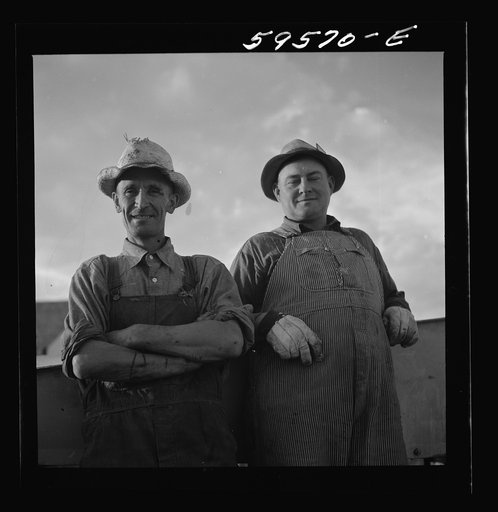 Untitled photo, possibly related to: Frank Hagemeister, treasurer of cooperative association, and Elmer A. Colpitts, on the board of directors of cooperatives association on Scottsbluff Farmsteads. FSA (Farm Security Administration) project, Scottsbluff, Nebraska.