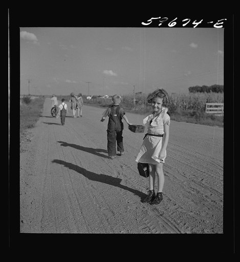 Untitled photo, possibly related to: Children coming home from school. Two Rivers Non-Stock Cooperative Company, FSA (Farm Security Administration) co-op. Waterloo, Nebraska